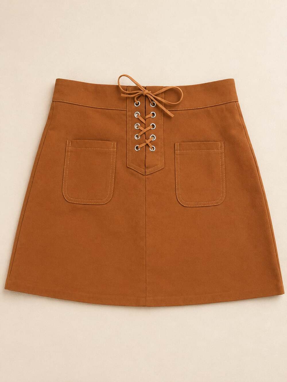 Faux Suede Lace-Up Mini Skirt with Front Pockets in Brown Size M